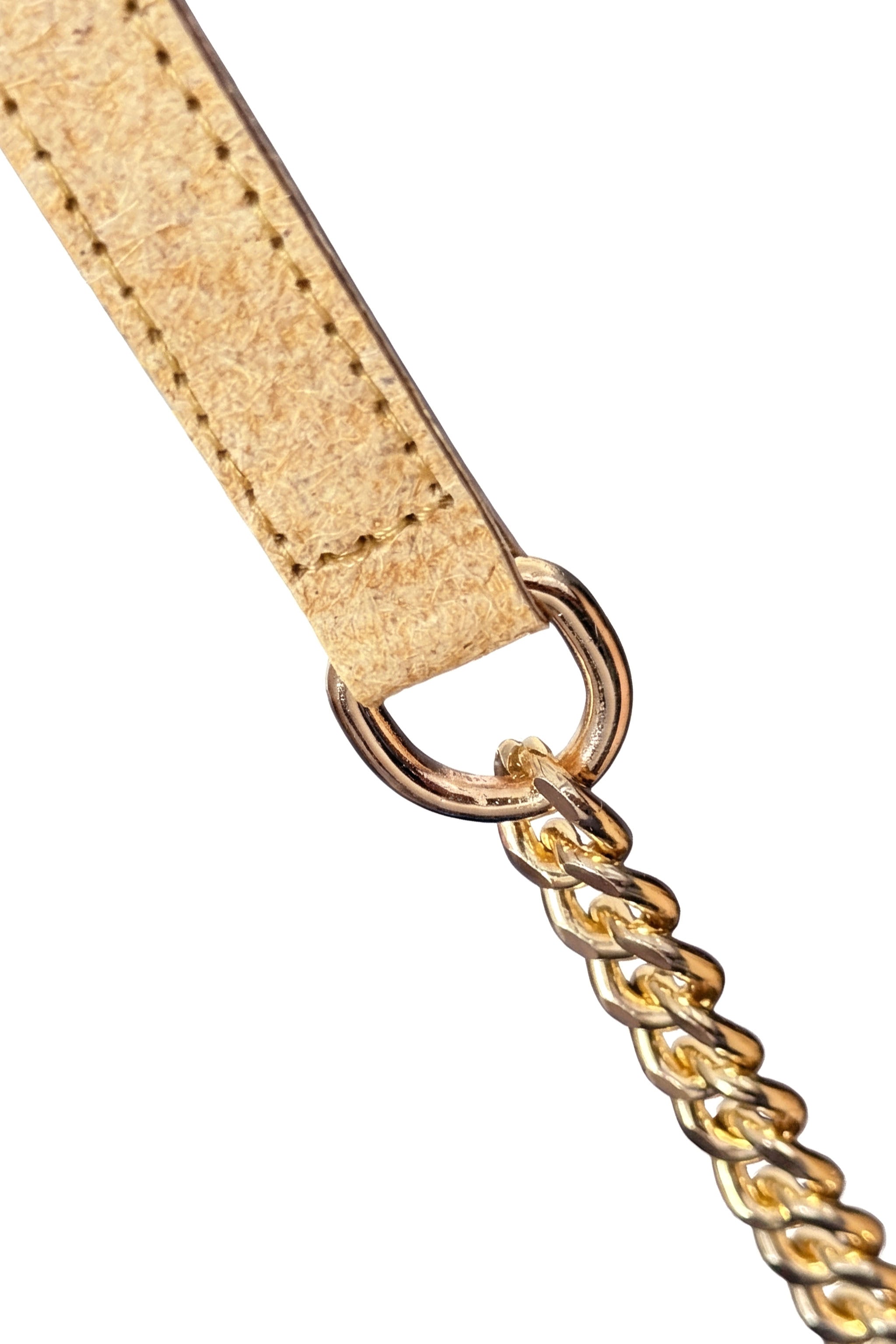 Close-up of a beige leather strap with a gold chain on a white background