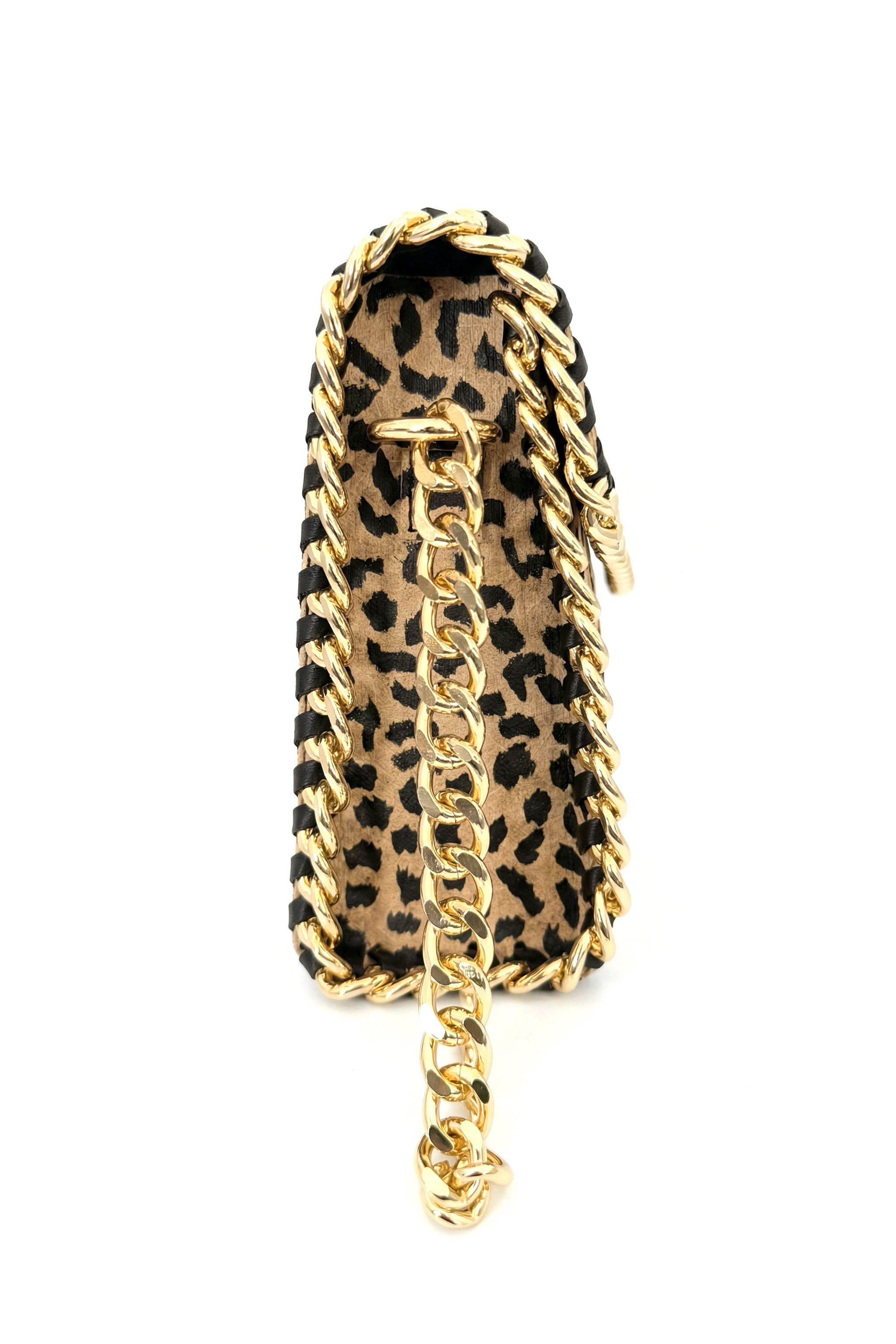Leopard print clutch side view with gold chain on a white background
